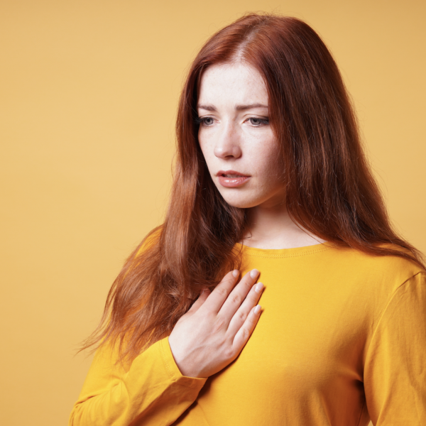 Woman with heartburn