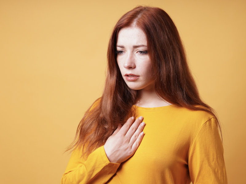 Woman with heartburn