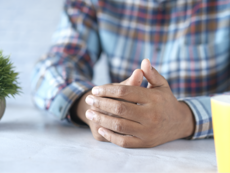 Nervous young man hands
