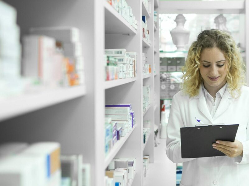 pharmacist doing a stock check for pyrocalm